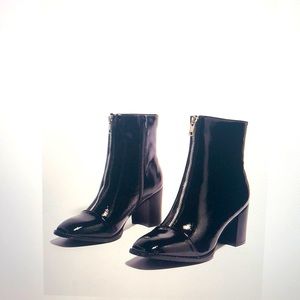 Patent leather zip up heeled boots